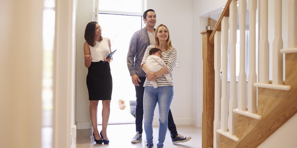 Estate agent conducting viewing